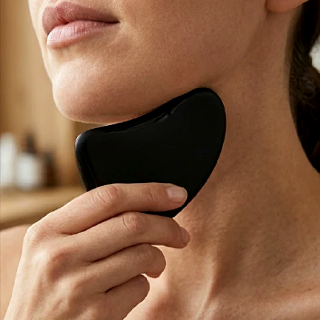 Gua sha i vulkansk stein